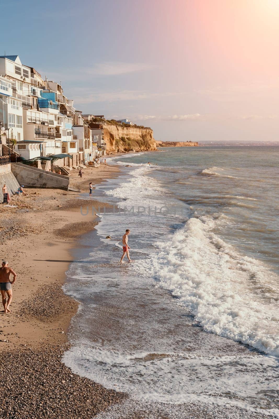 coastal area with apartment buildings of residential areas, modern hotel and restaurant complex on water and sandy beaches