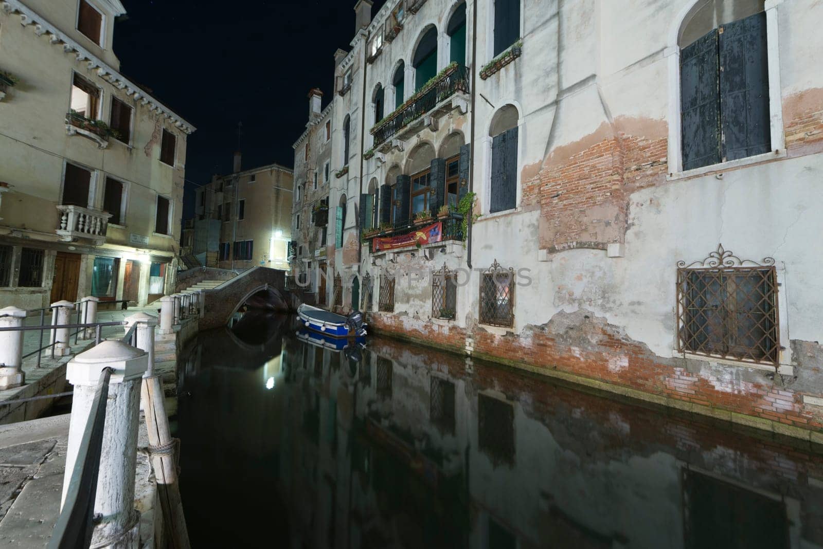 venice canals night view with light reflections