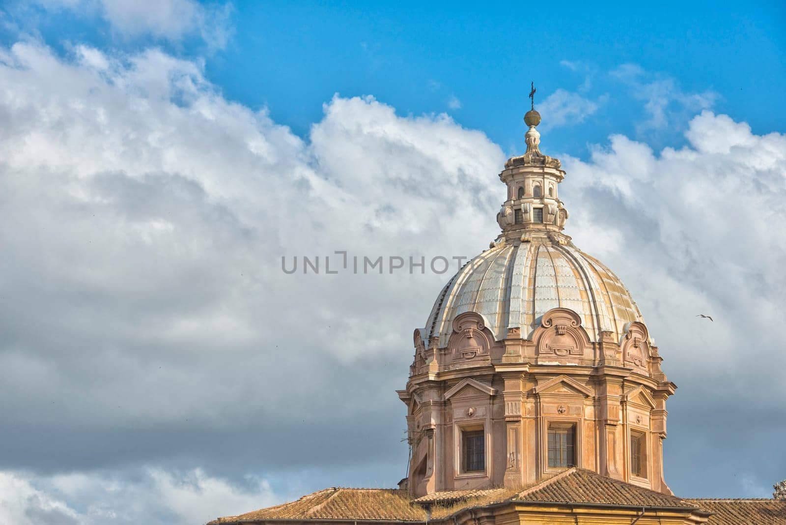 rome church dome on blue cloudy sky