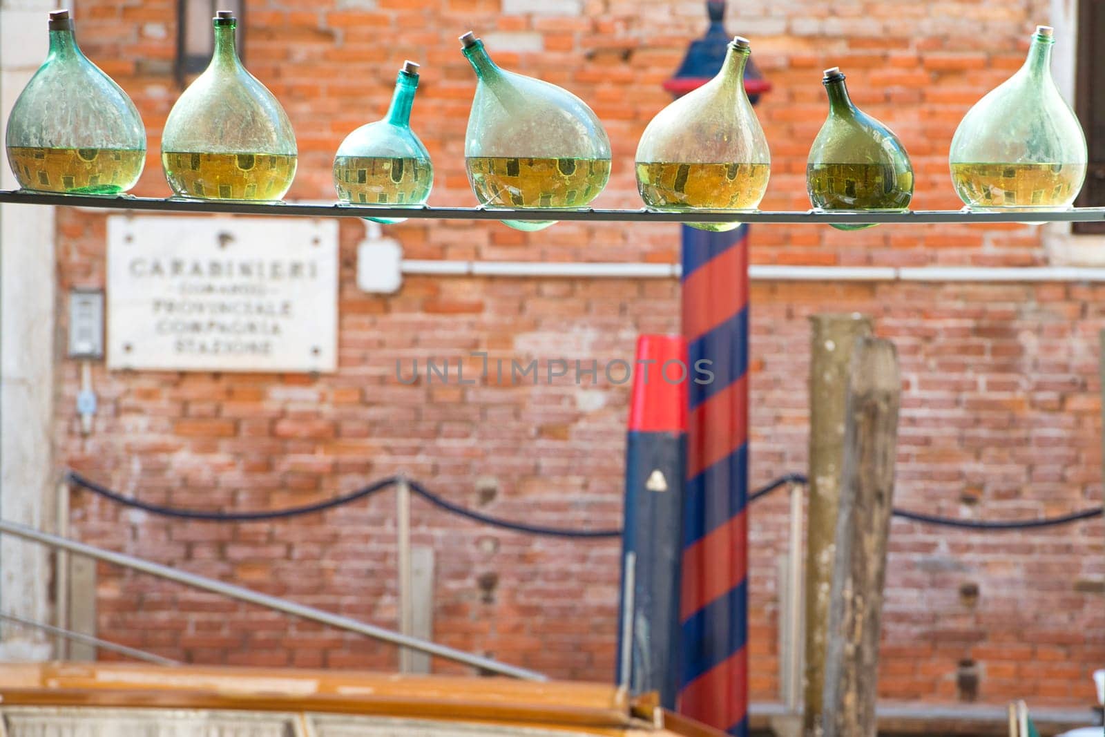 Venice canals reflected in a bottle