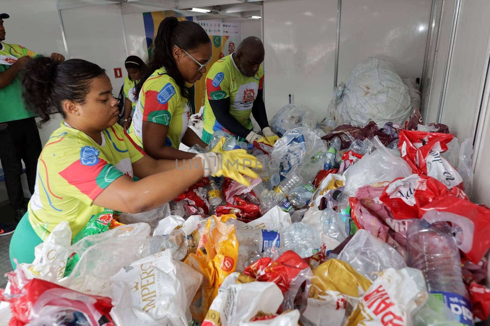 salvador, bahia, brazil - february 11, 2024: worker at a recycling center for waste from carnival in Salvador.

