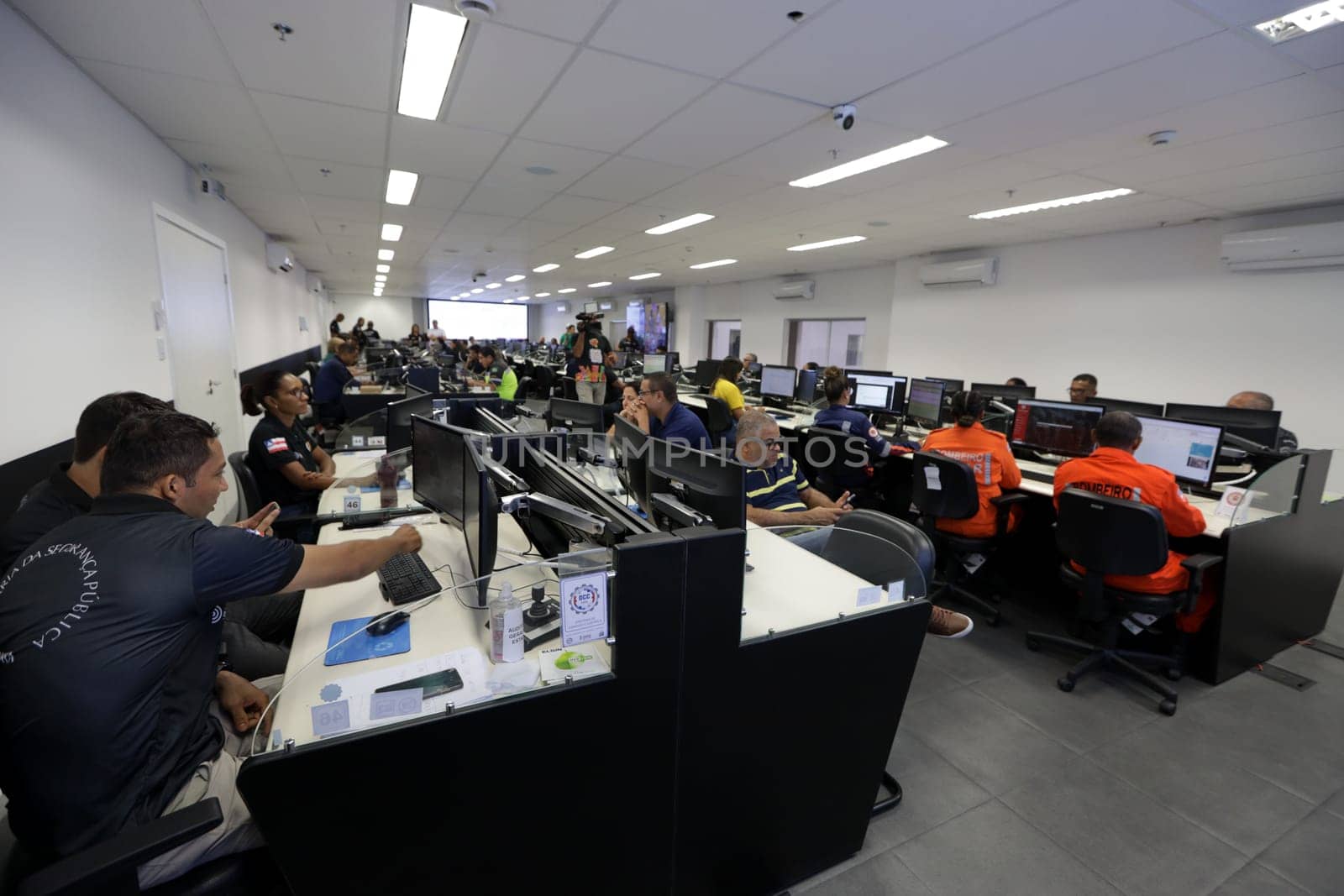 salvador, bahia, brazil - february 12, 2024: Security forces professionals working at the integrated control and command center in the city of Salvador