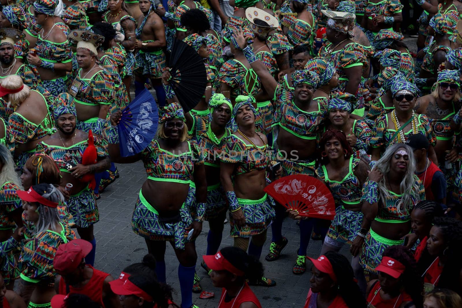 salvador, bahia, brazil - february 10, 2024: members of the caranval group As Muquiranas are seen during the carnival in the city of Salvador.