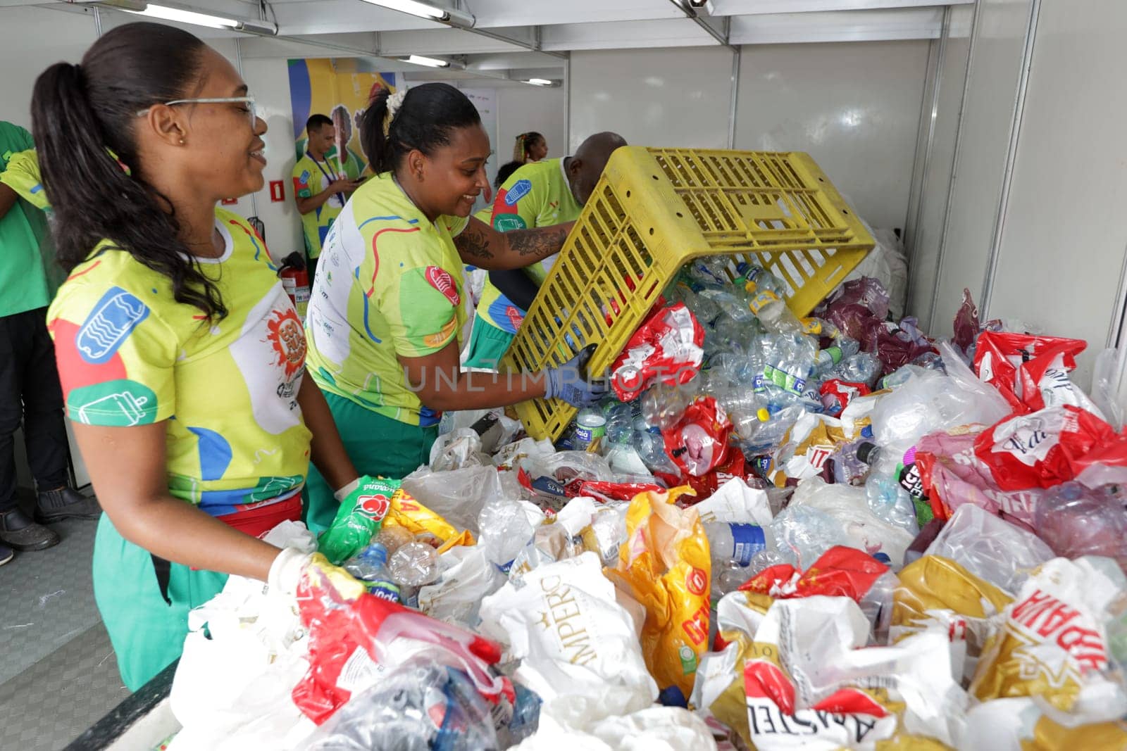 salvador, bahia, brazil - february 11, 2024: worker at a recycling center for waste from carnival in Salvador.

