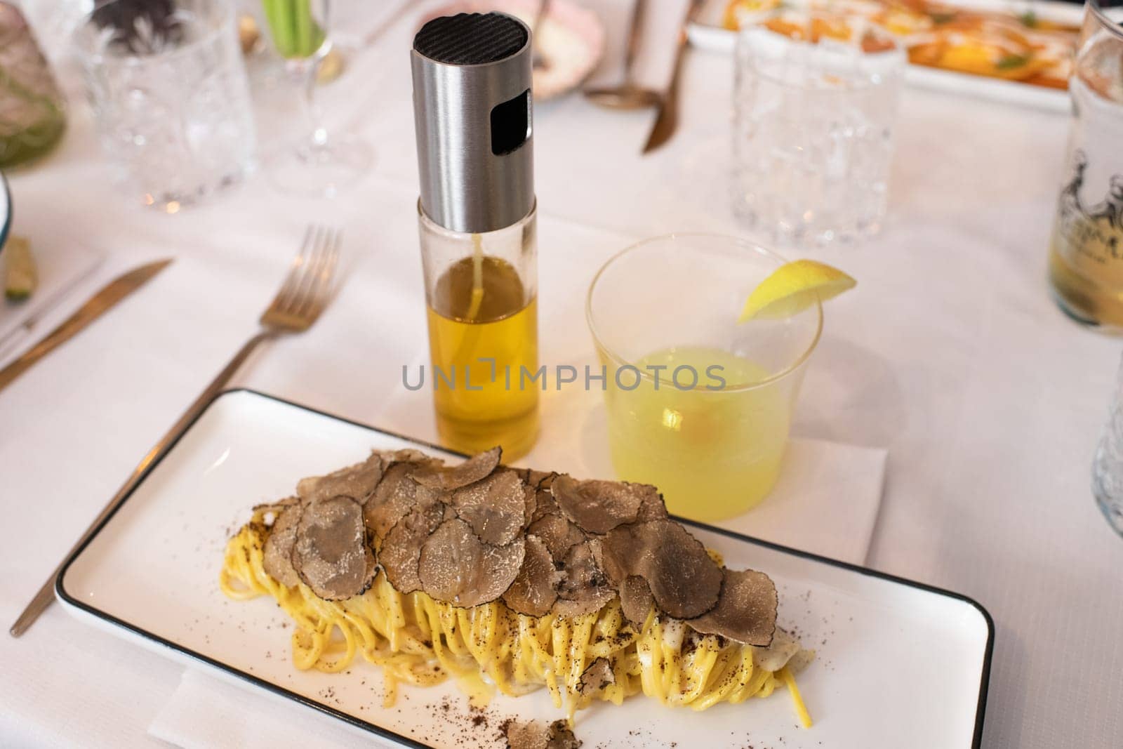 Italian pasta with truffle mushrooms and limoncello in a restaurant