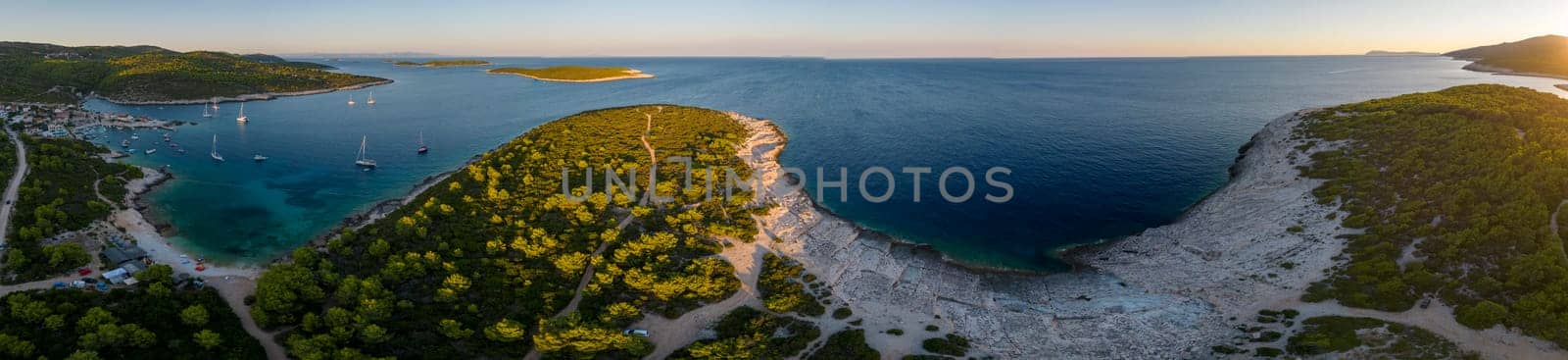 at sunset Vis Island, in Italian Lissa, island of Croatia in the Adriatic Sea. It is the outermost major island of the Dalmatian archipelago panoramic aerial view landscape