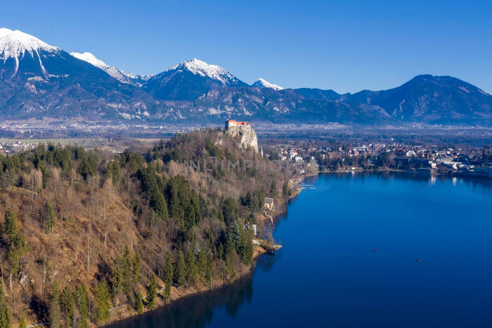 Bled lake rock castle aerial view panorama in winter season