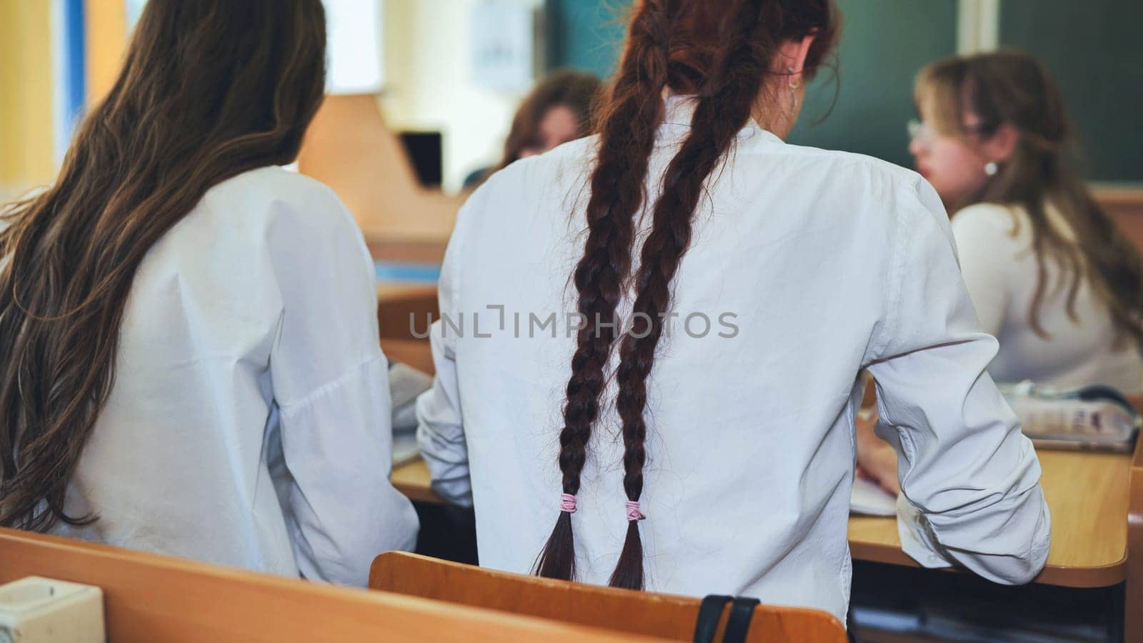 Long pigtails on a high school girl