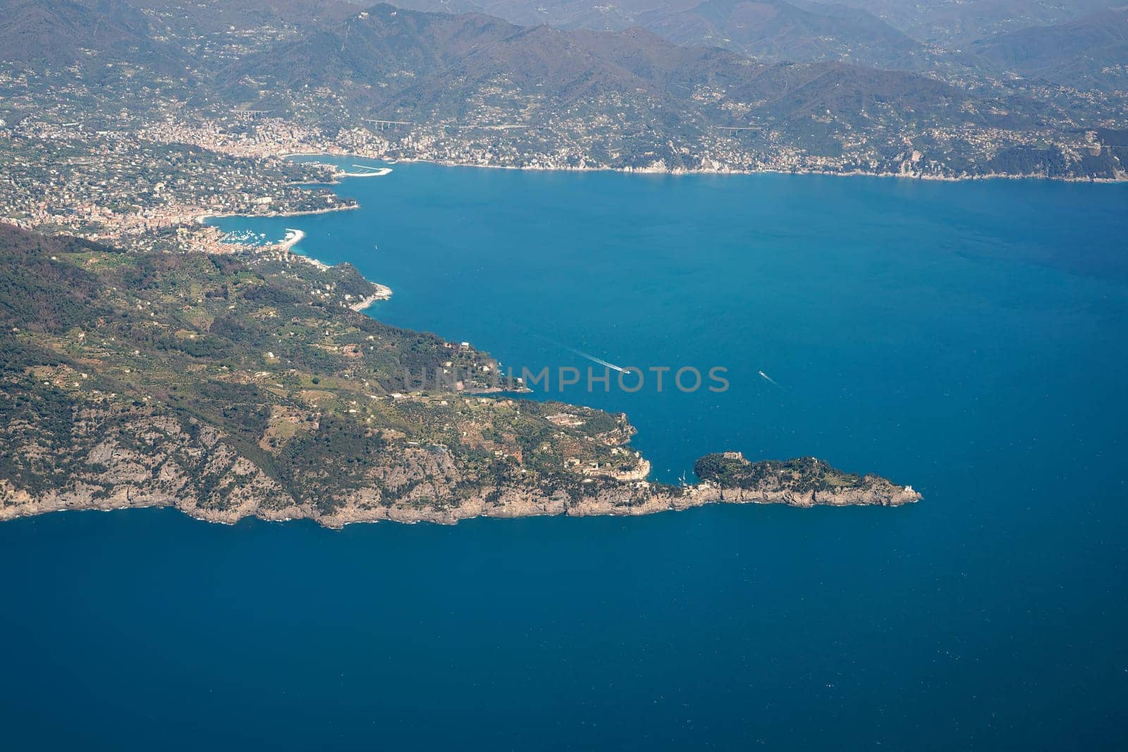 The Natural Park of Portofino, Liguria, Italy. aerial view from airplane before landing in Genoa