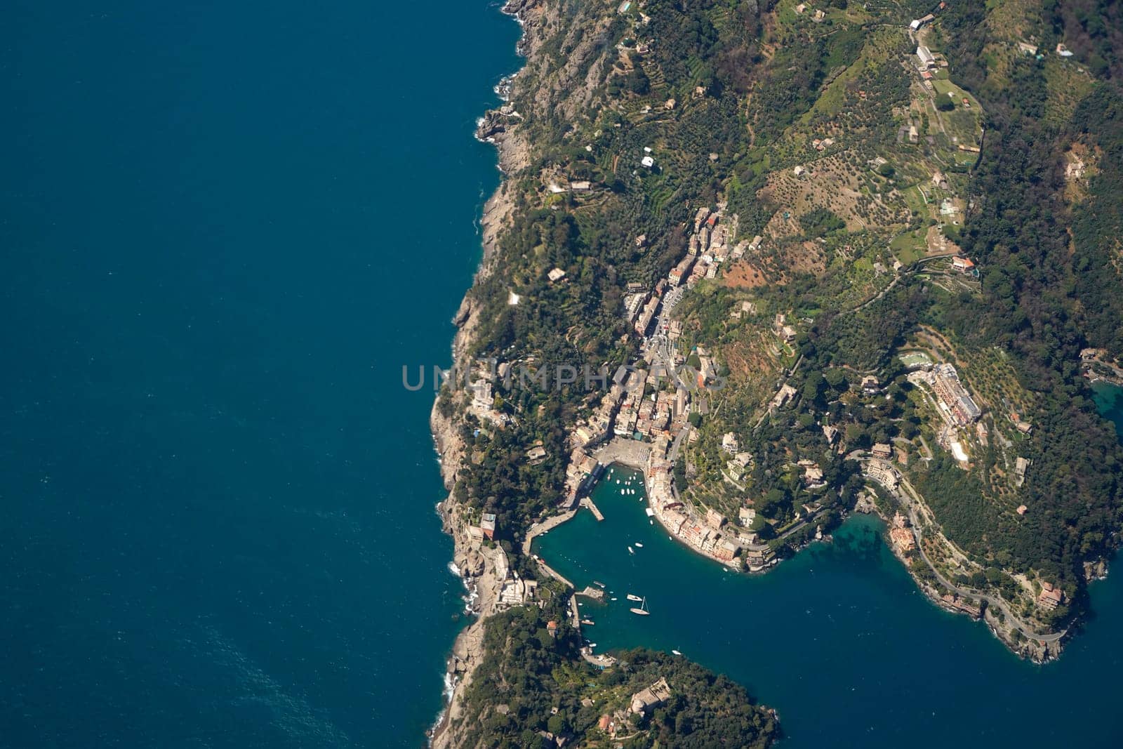 The Natural Park of Portofino, Liguria, Italy. aerial view from airplane before landing in Genoa