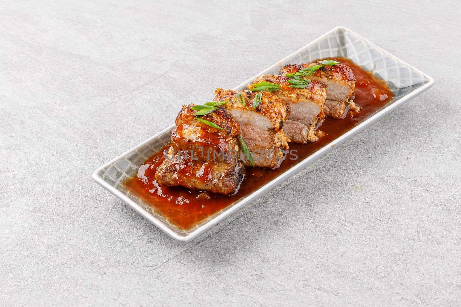 roasted appetizing pork on a stone background studio food photo 2 by Mixa74