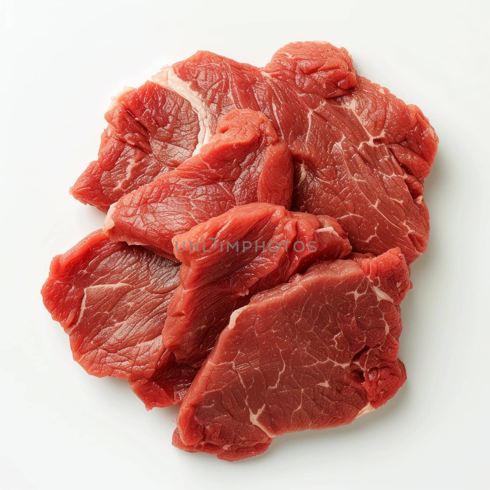 Set of raw cut beef fillet meat isolated on white background, top view by papatonic