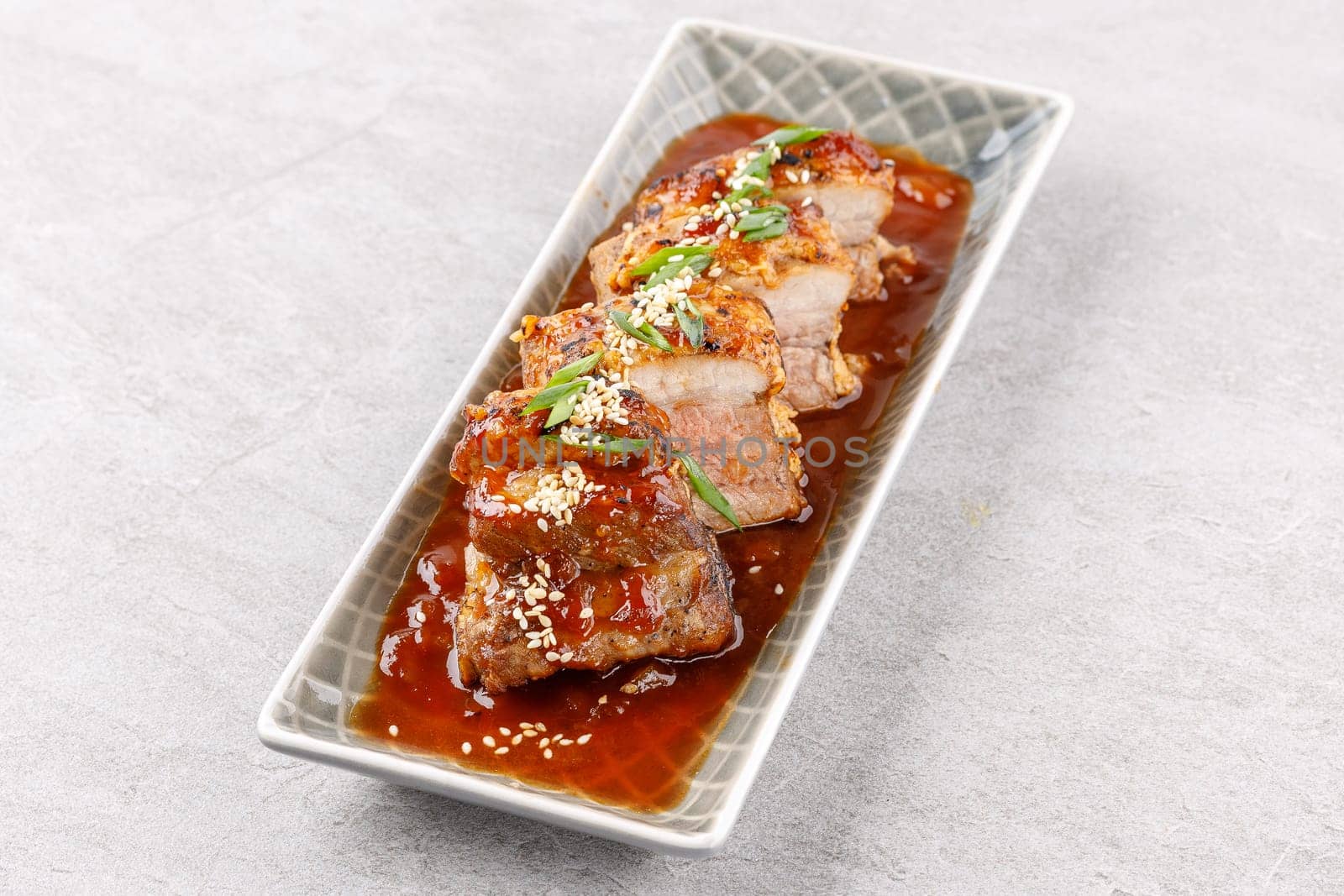 roasted appetizing pork on a stone background studio food photo 8 by Mixa74