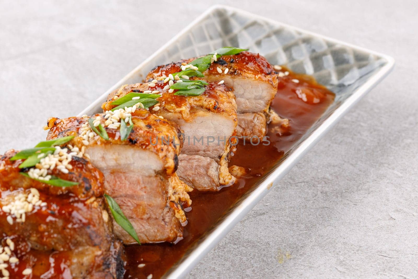 roasted appetizing pork on a stone background studio food photo 7 by Mixa74