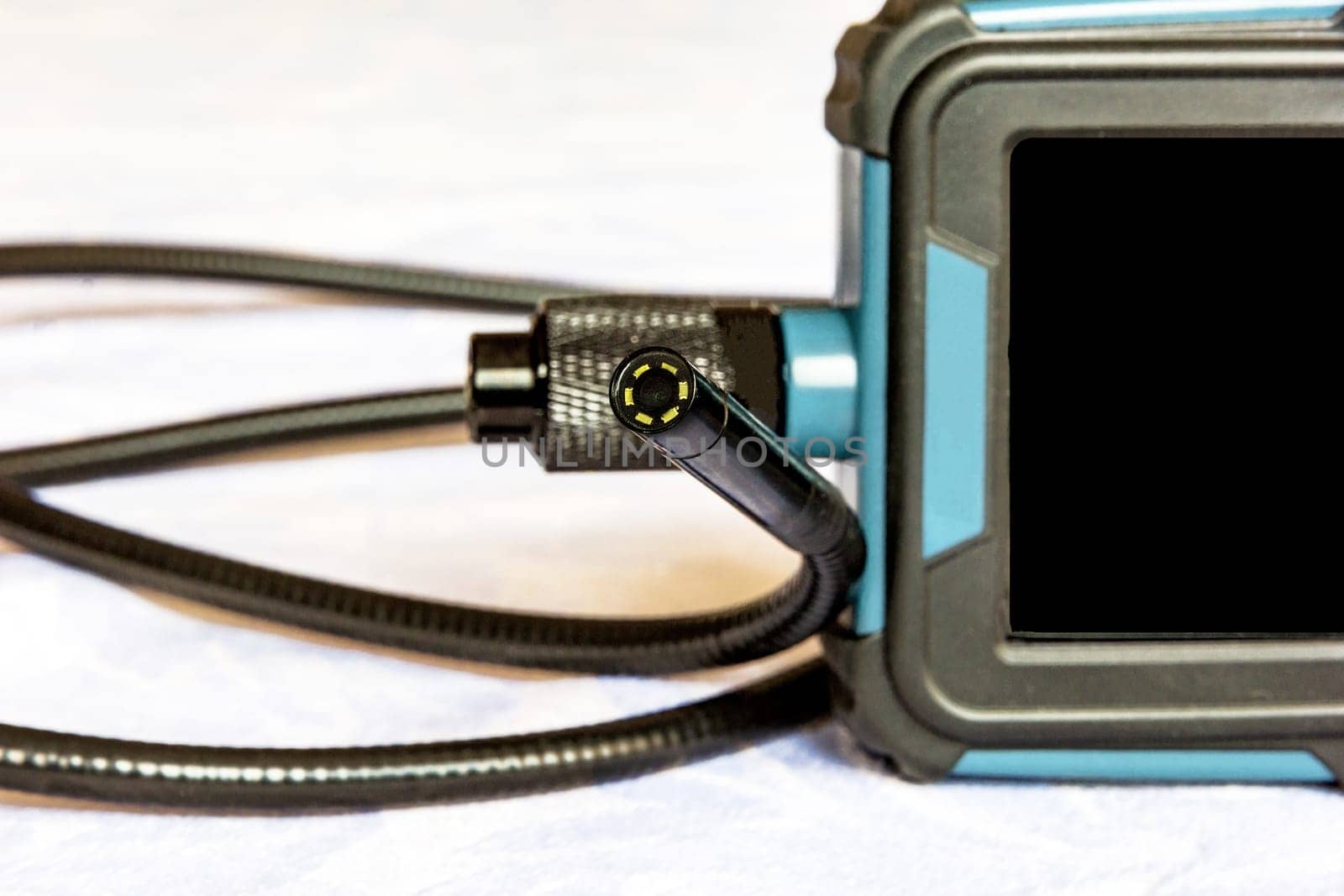 Endoscope camera on the table. Flexible inspection camera by EdVal
