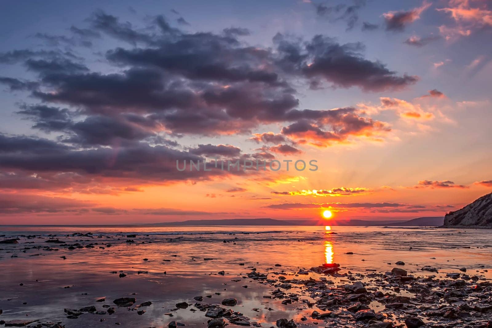 Exciting sunset view at the Black sea rocky coast,