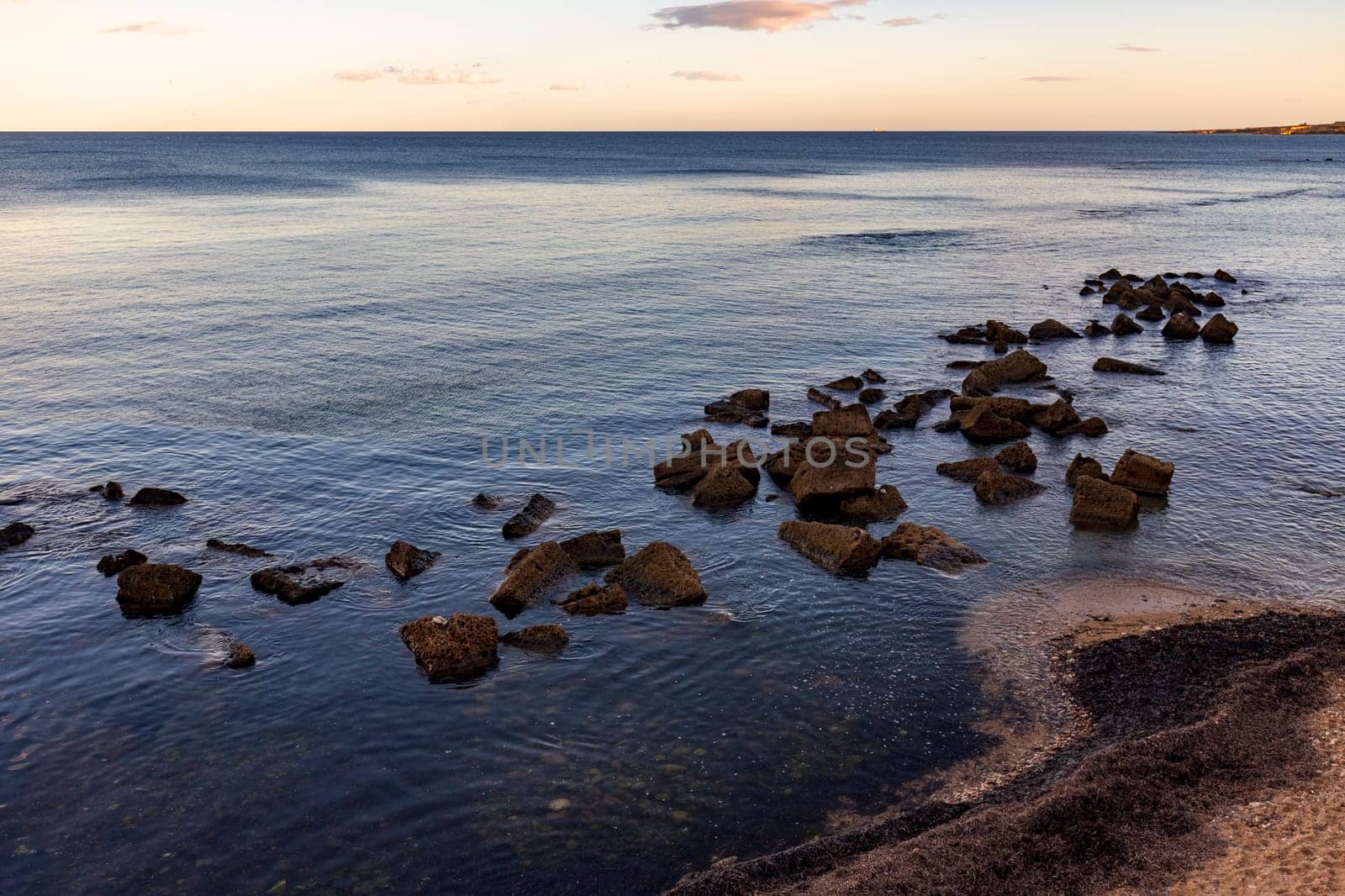 Seascape with rocks near the beach by EdVal