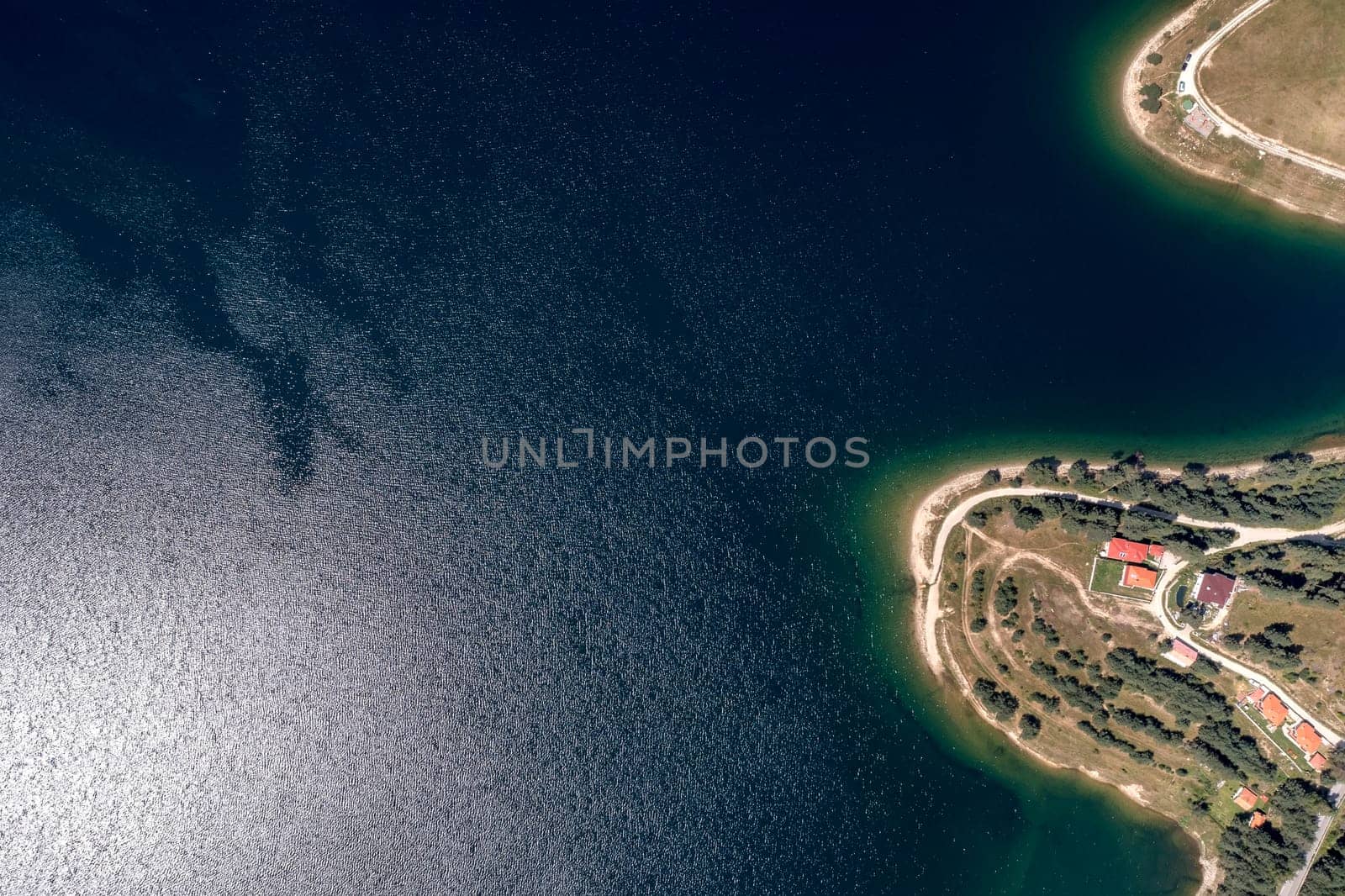 aerial top view of the lake's coastline