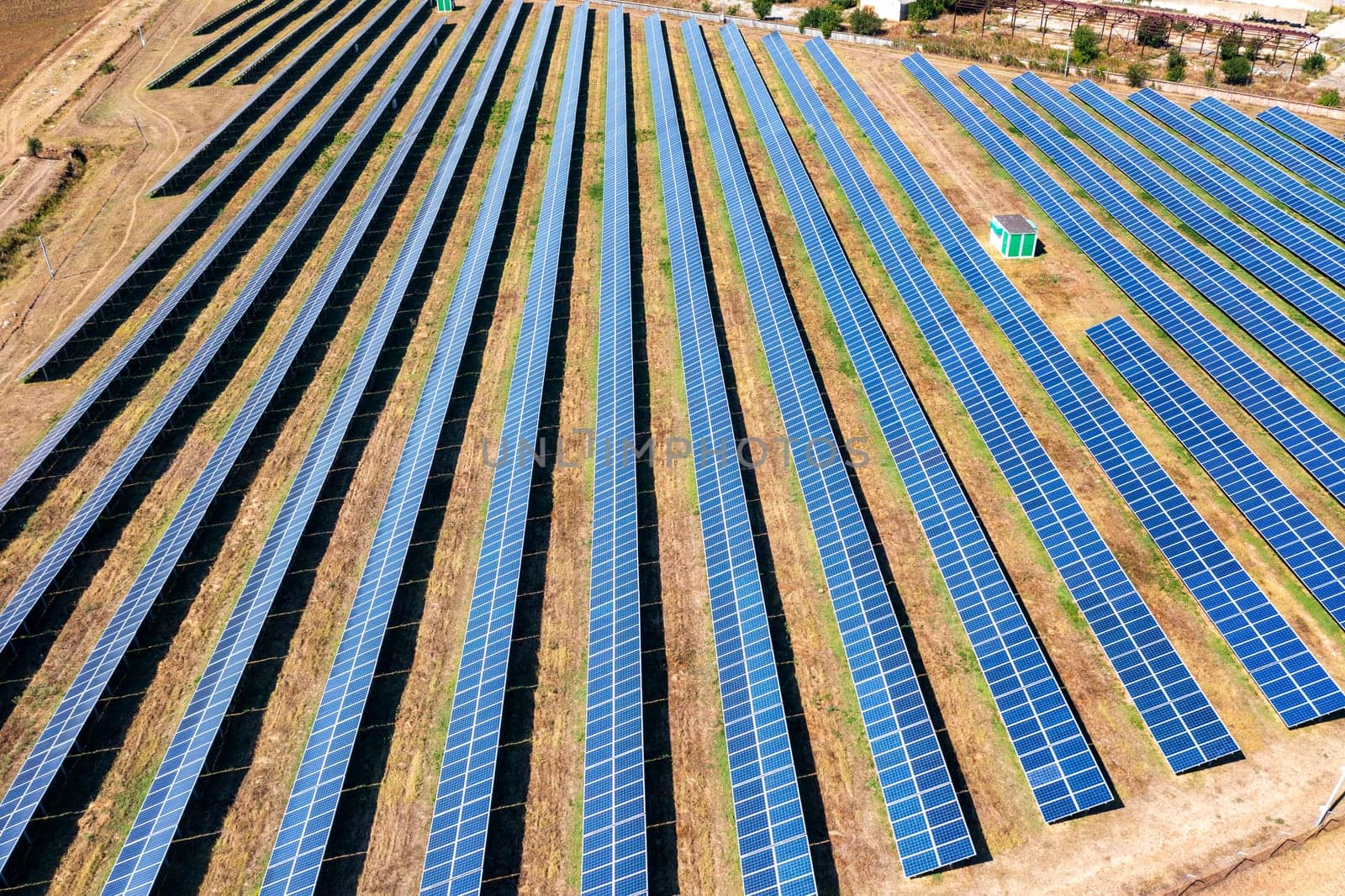 Aerial top view from drone of a field of solar panels