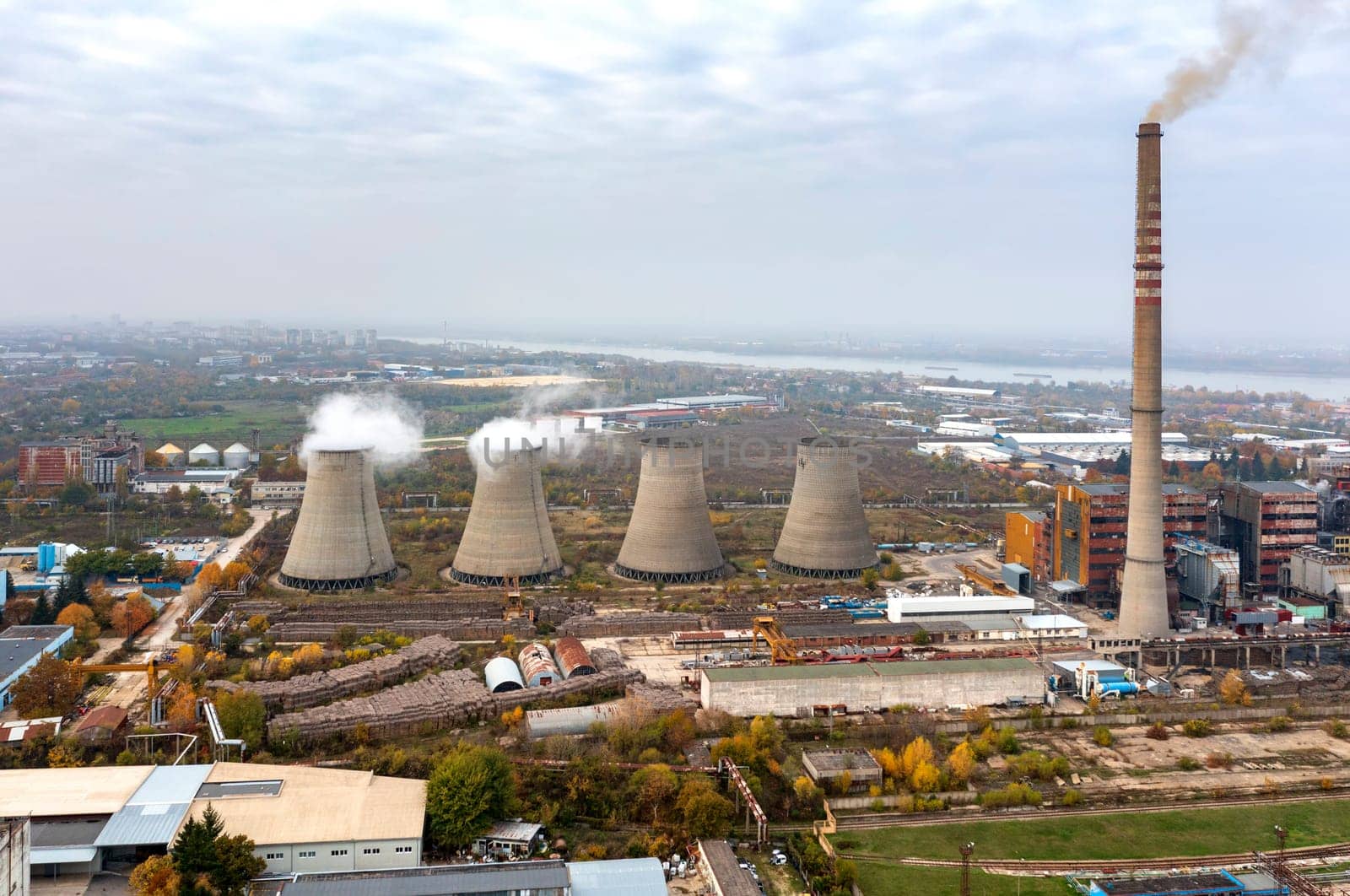 Aerial View Of Large Chimneys From The Coal Power Plant  by EdVal