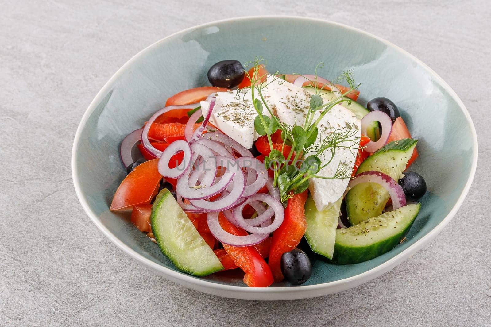 Greek salad on a stone background studio food photo 2