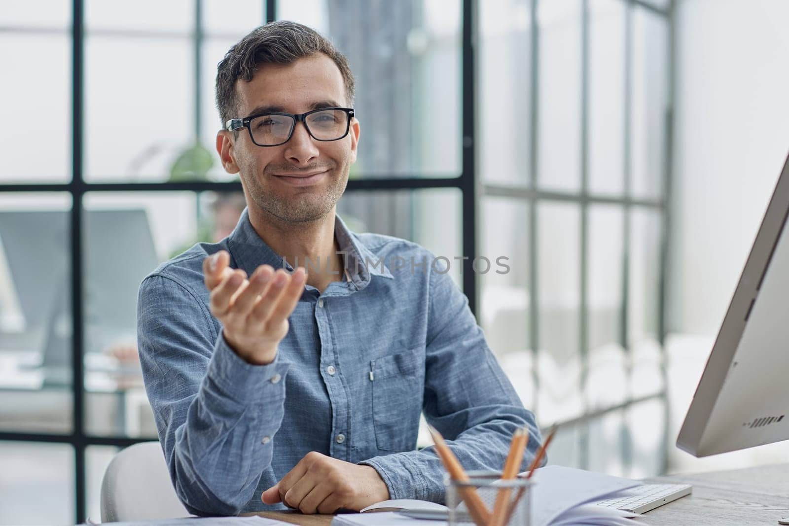 Smiling Male Extending Hand For Handshake At Camera, Offering Partnership