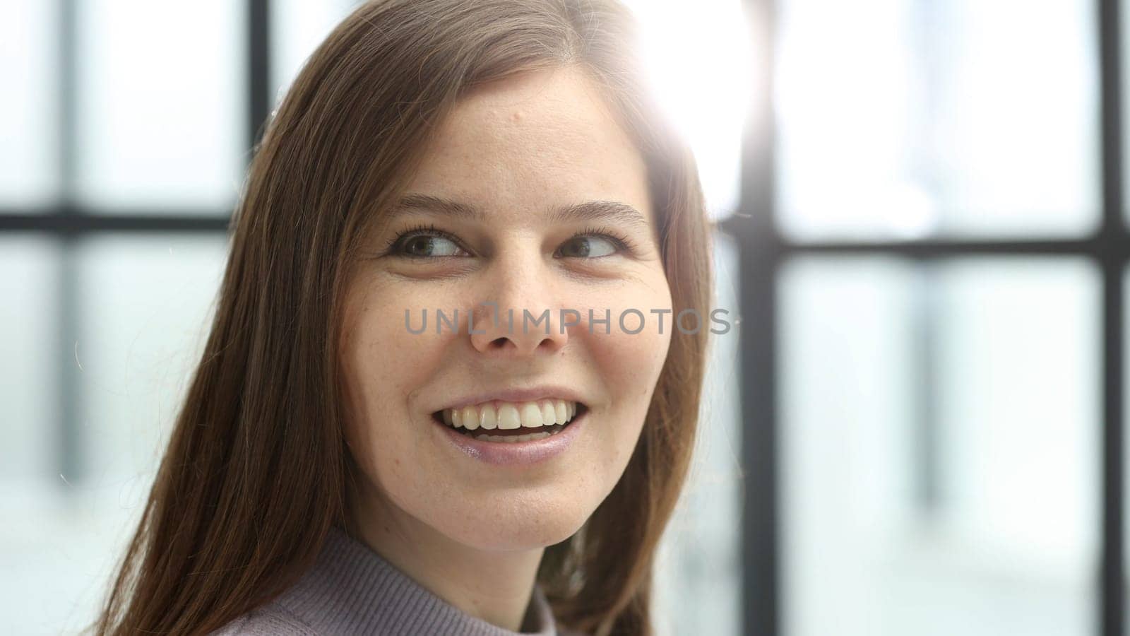 Close-up of a woman's face in the office.