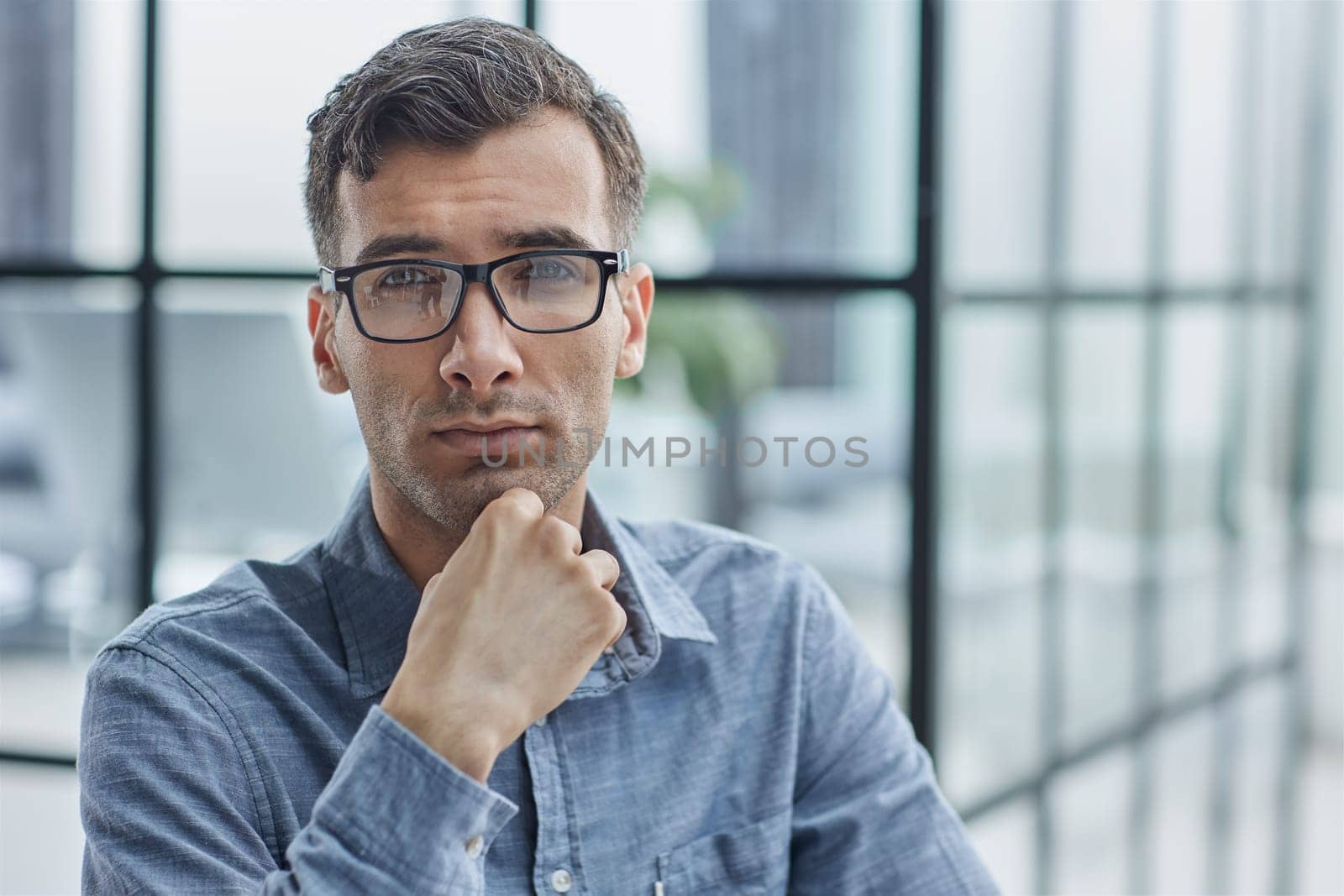 thoughtful male employee pondering considering idea