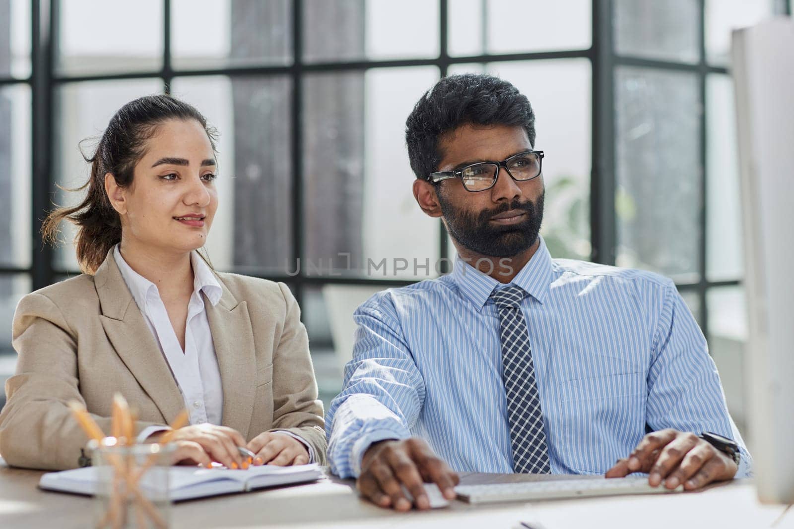 Startup business partners working together in desktop