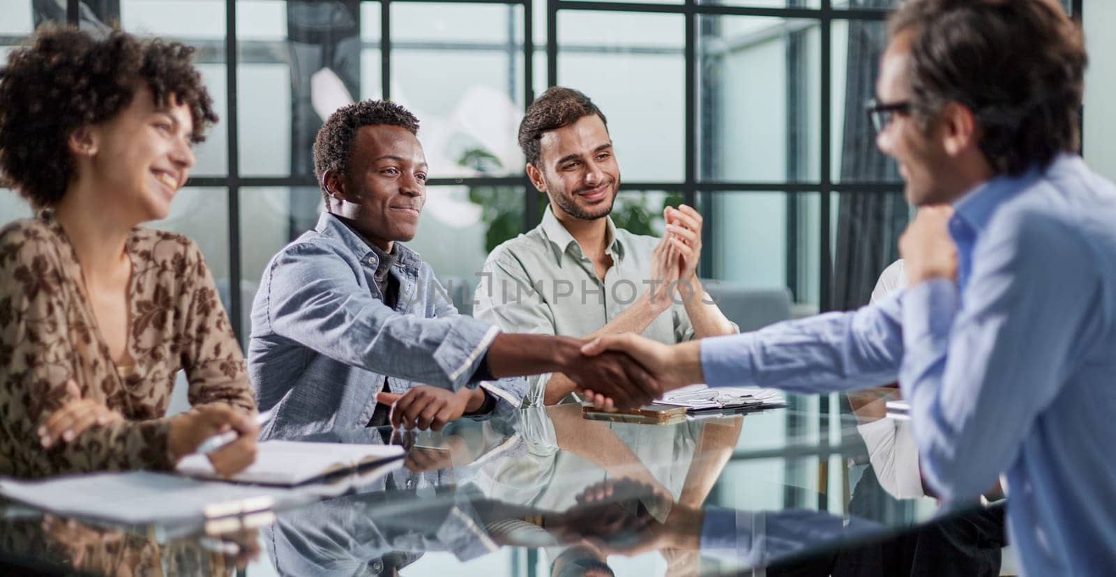 handshake during a successful meeting by Prosto