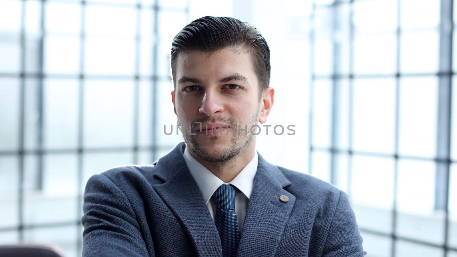 Male businessman in close-up in the office.