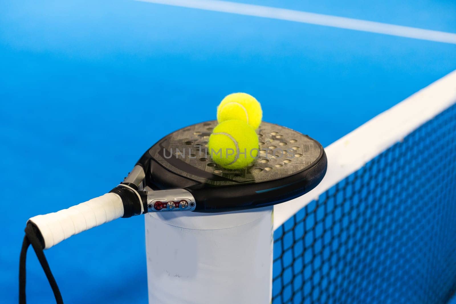 Paddle objects on blue turf. High quality photo