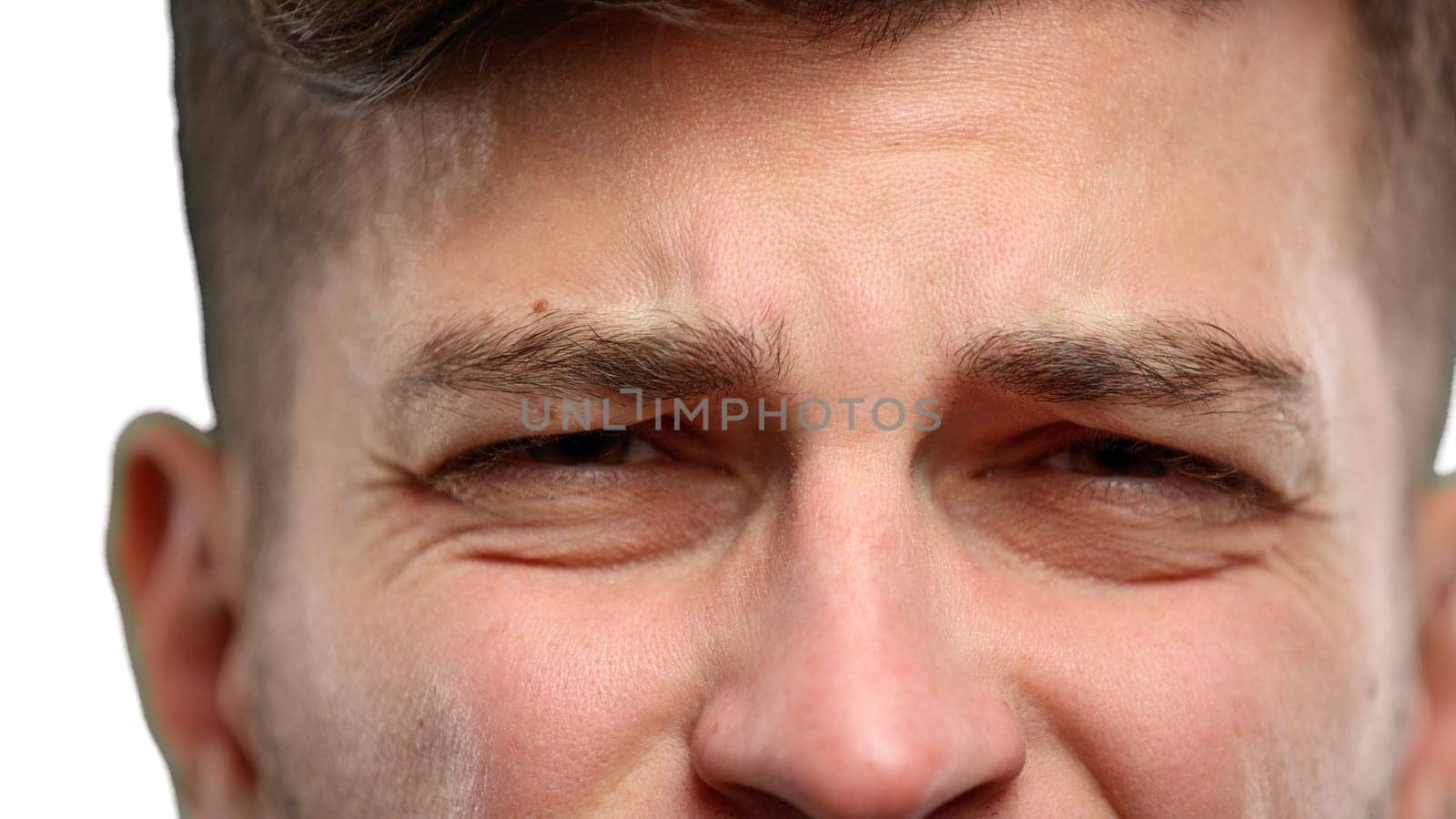 Man's eyes, close-up, on a white background.