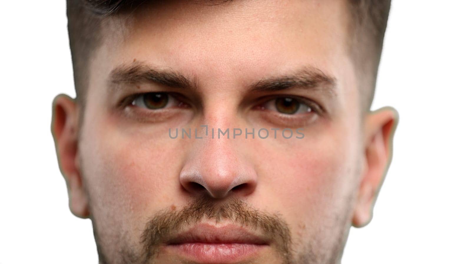 Man's eyes, close-up, on a white background.