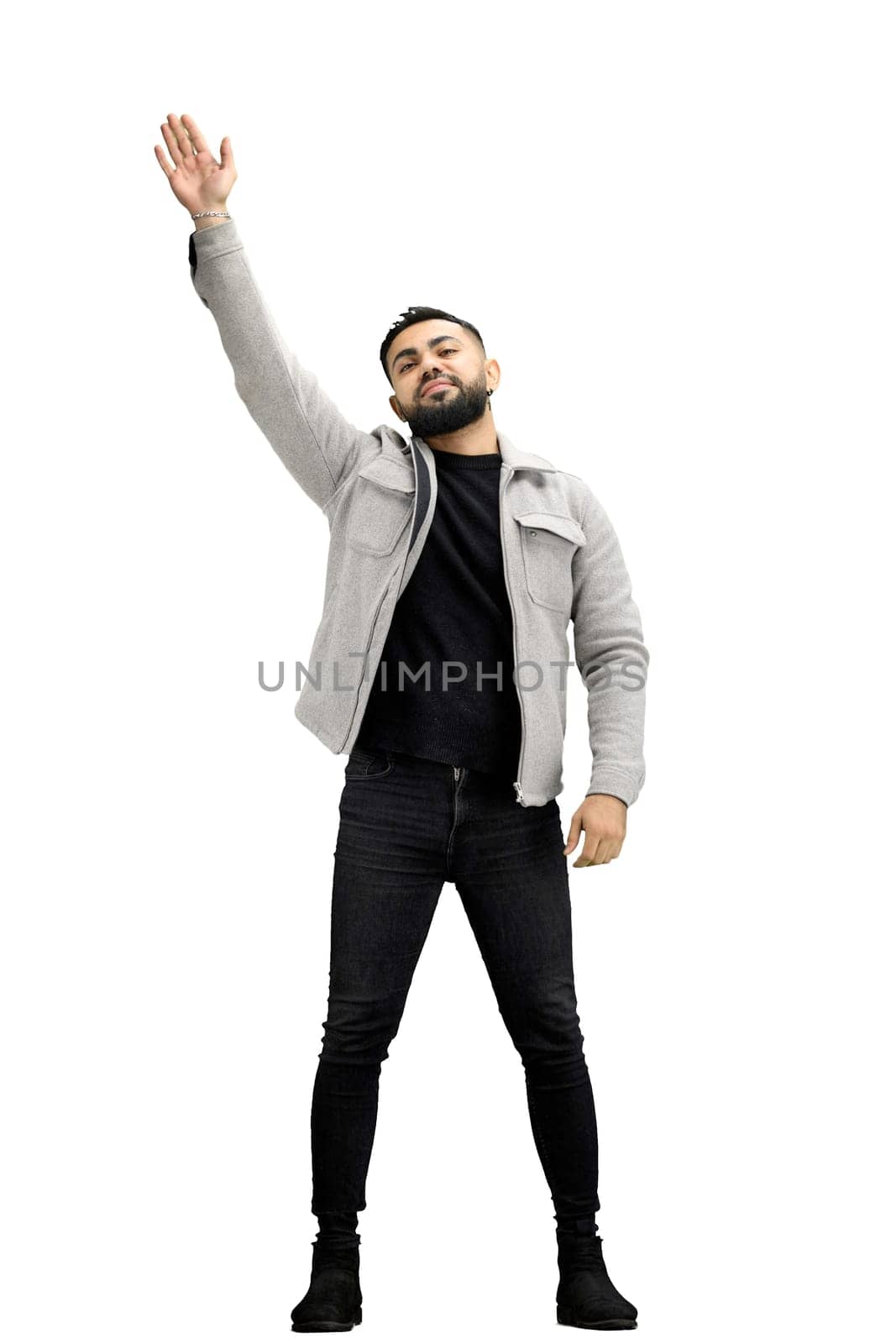 A man, full-length, on a white background, waving his hand.