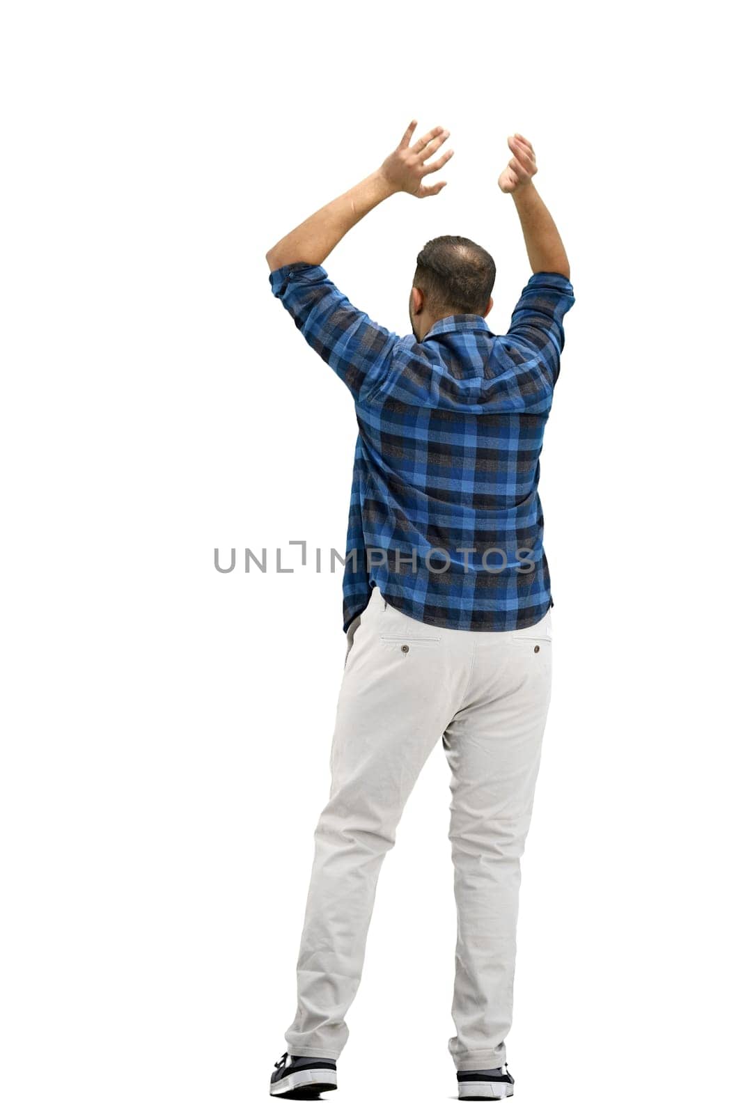 A man, full-length, on a white background, raised his hands up by Prosto