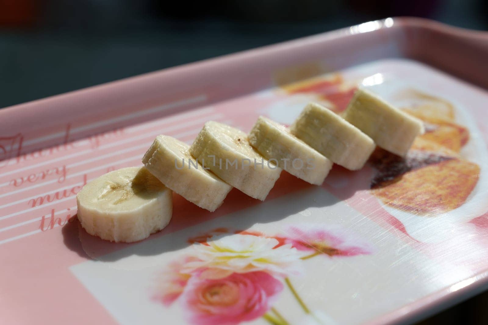 fresh organic banana in a plate on the table by Montypeter