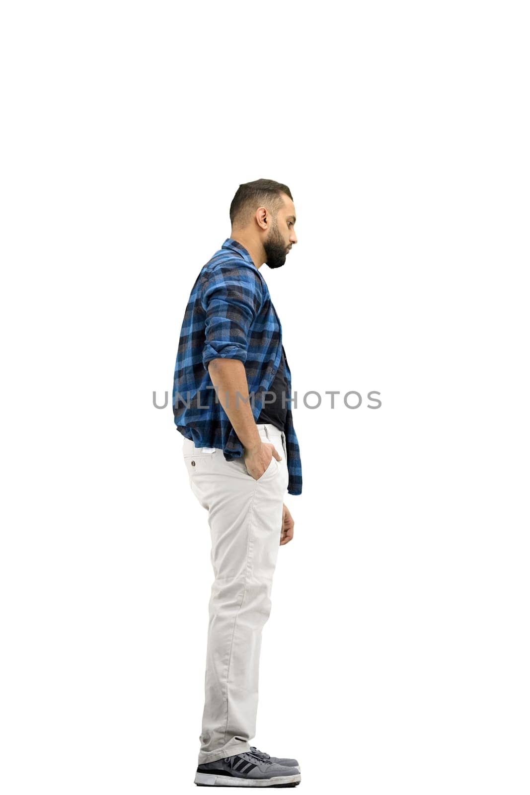A man, full-length, on a white background.