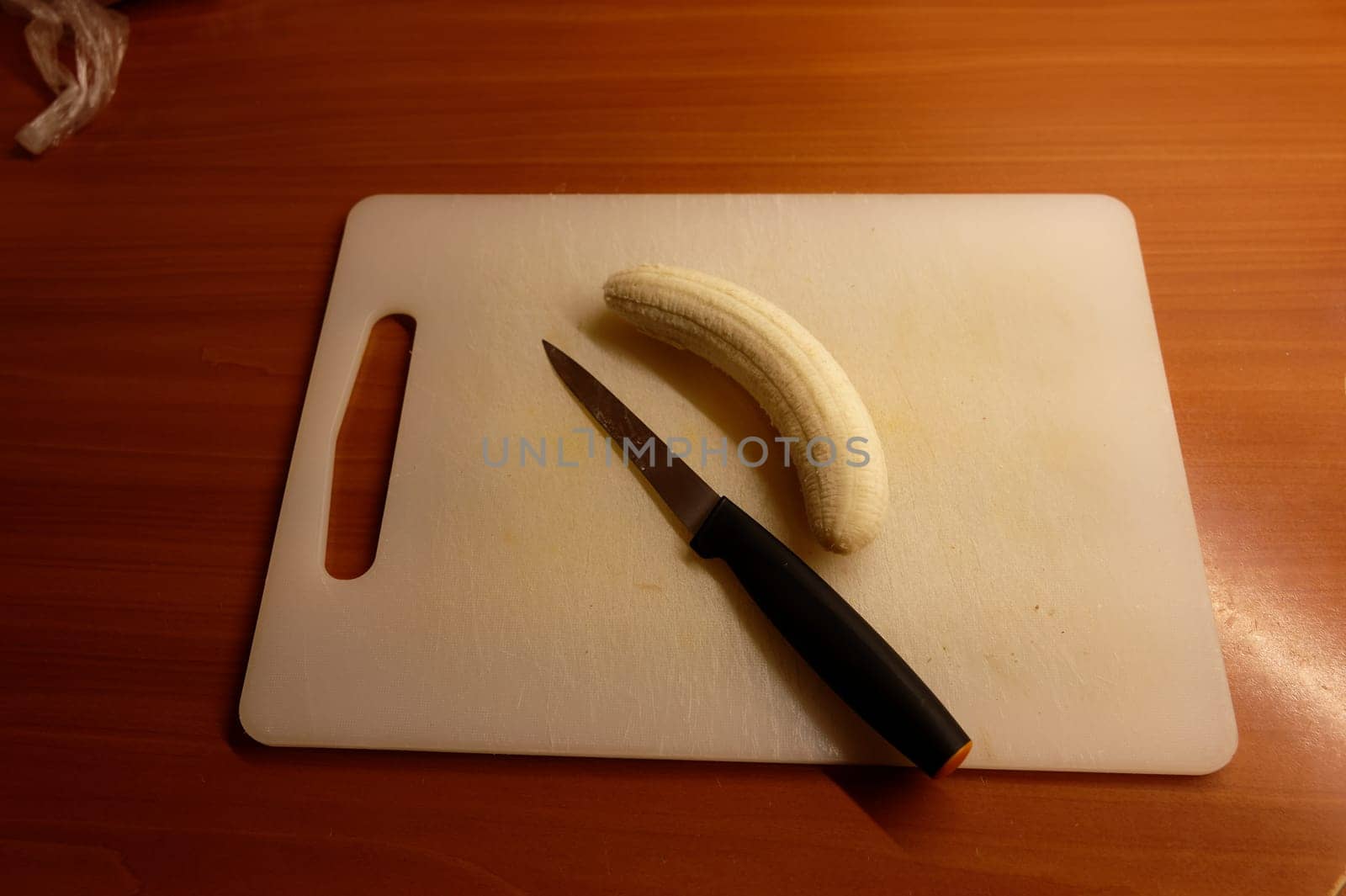 fresh organic banana in a plate on the table by Montypeter