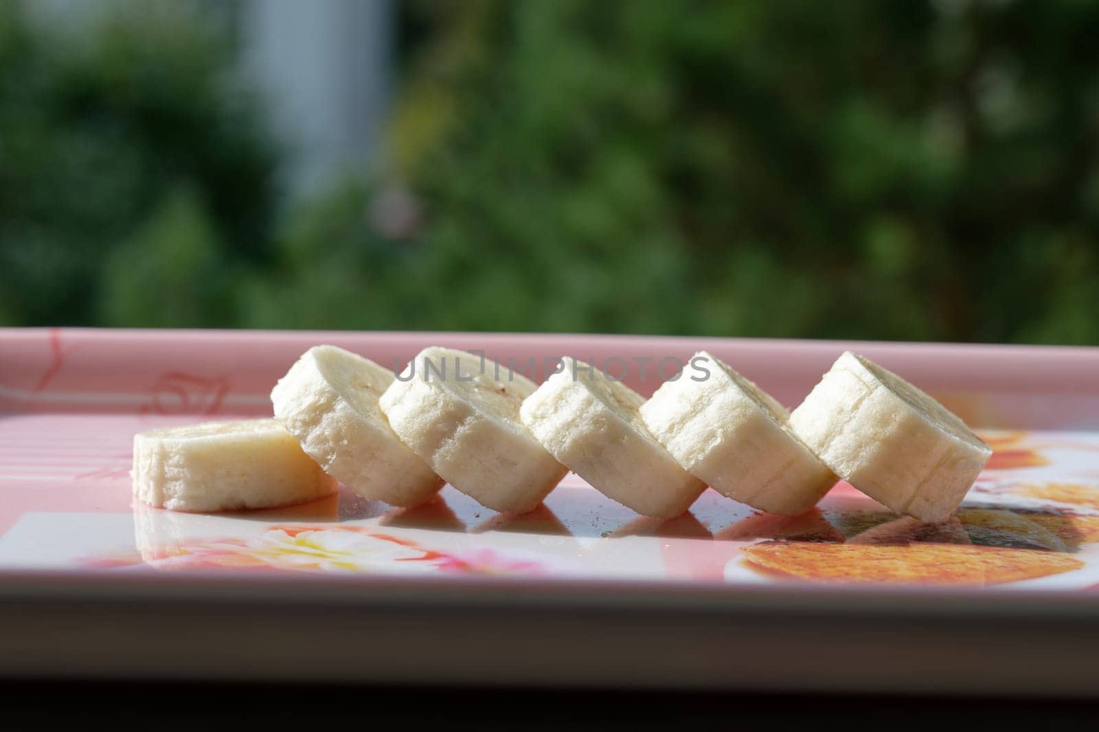 fresh organic banana in a plate on the table