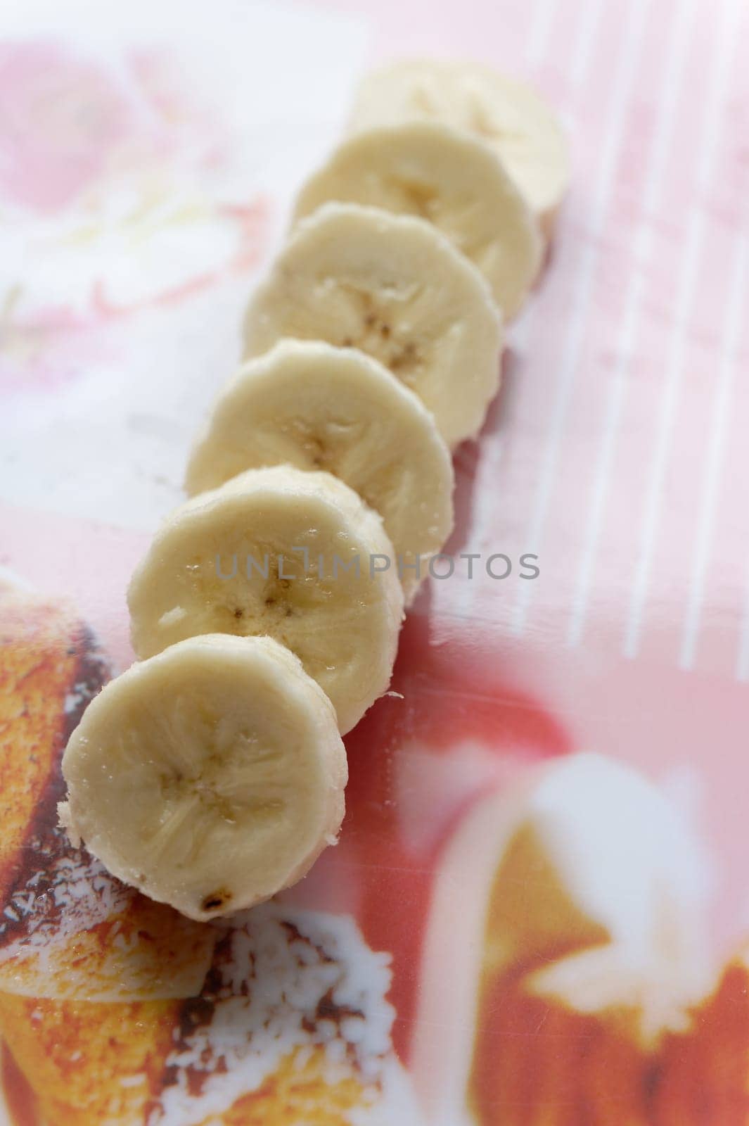 fresh organic banana in a plate on the table by Montypeter