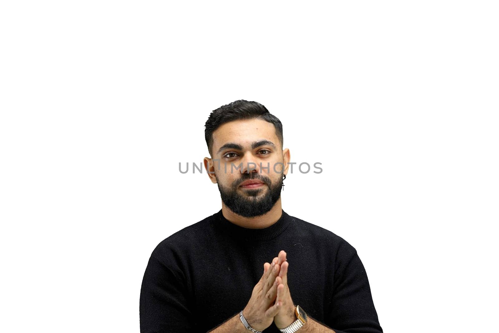 A man, close-up, on a white background, pleads.