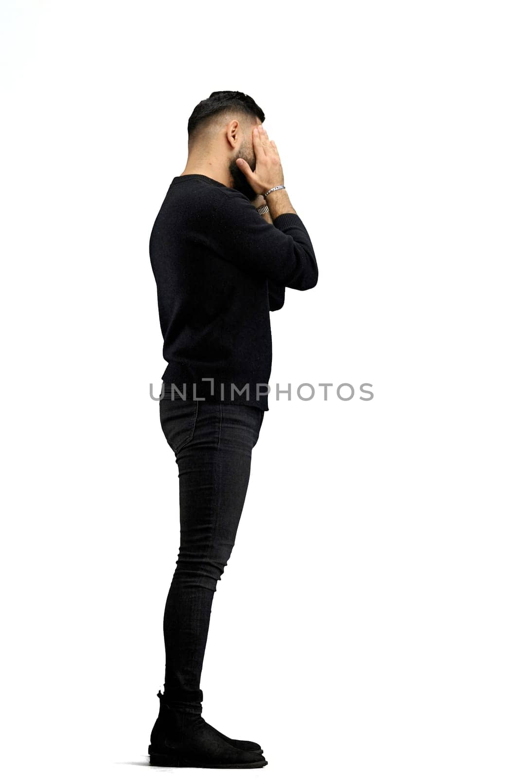 A man, in full height, on a white background, tired.