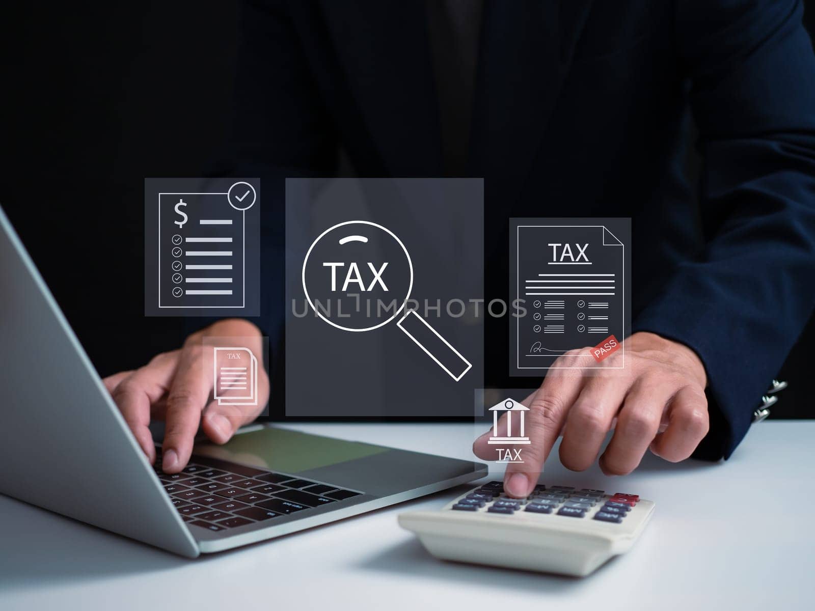 Businessman using a computer to complete Individual income tax return form online for tax payment. financial research, report. Calculation tax return. by Unimages2527