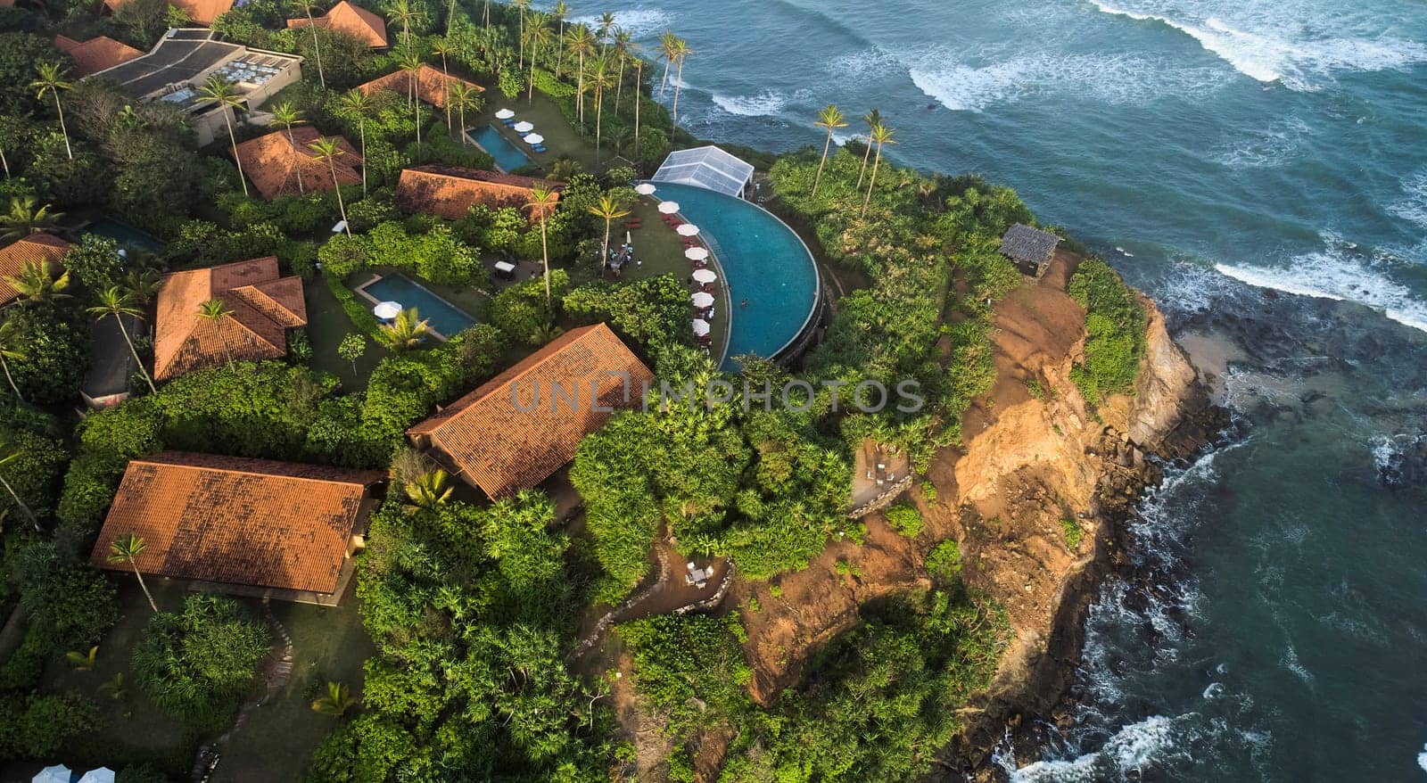 Aerial view of a premium hotel complex with swimming pools in Sri Lanka. High quality photo