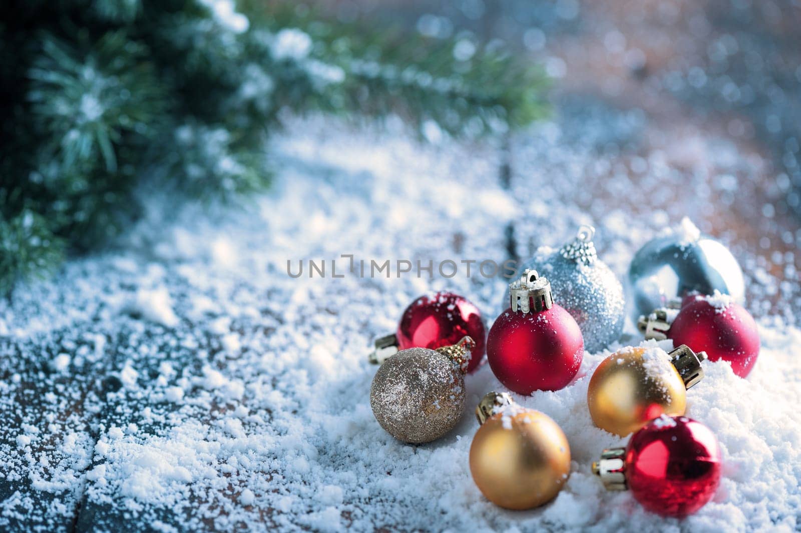 fir tree branches and decorations in Christmas and New Year concept. closeup at decoration balls