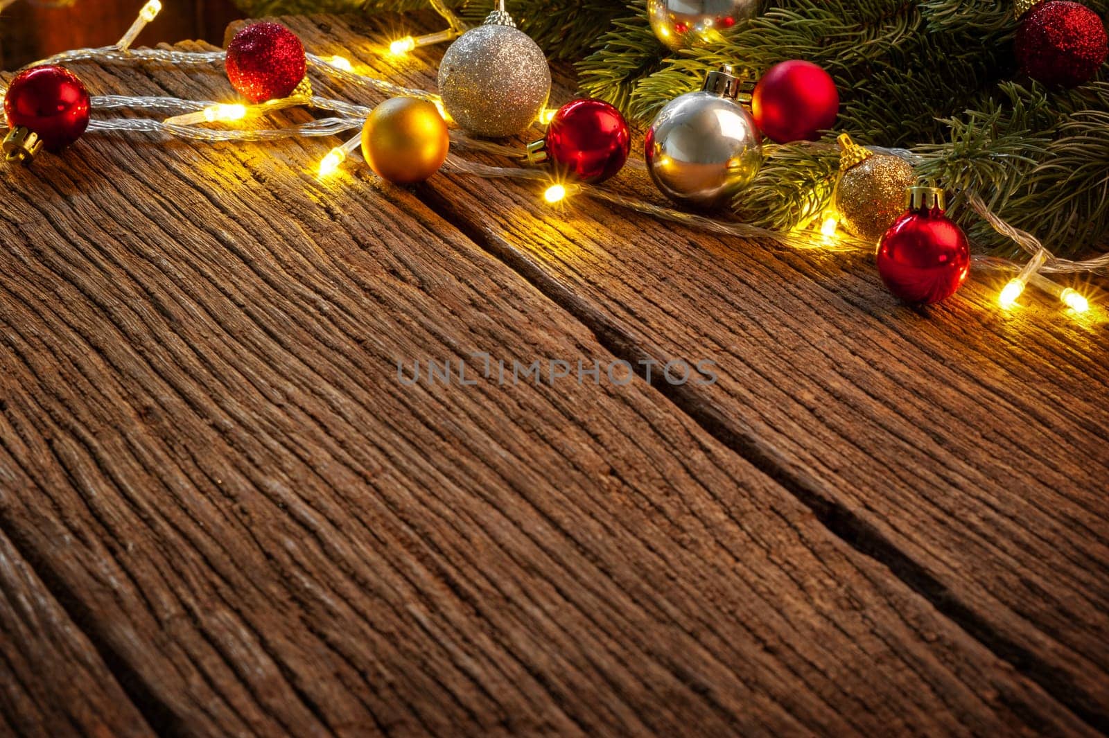 wooden table with fir tree and decorations. Christmas and New Year concept