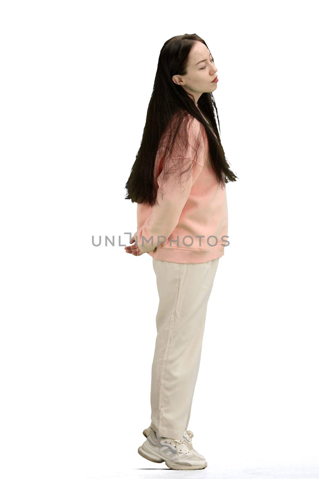 A woman, full-length, on a white background.