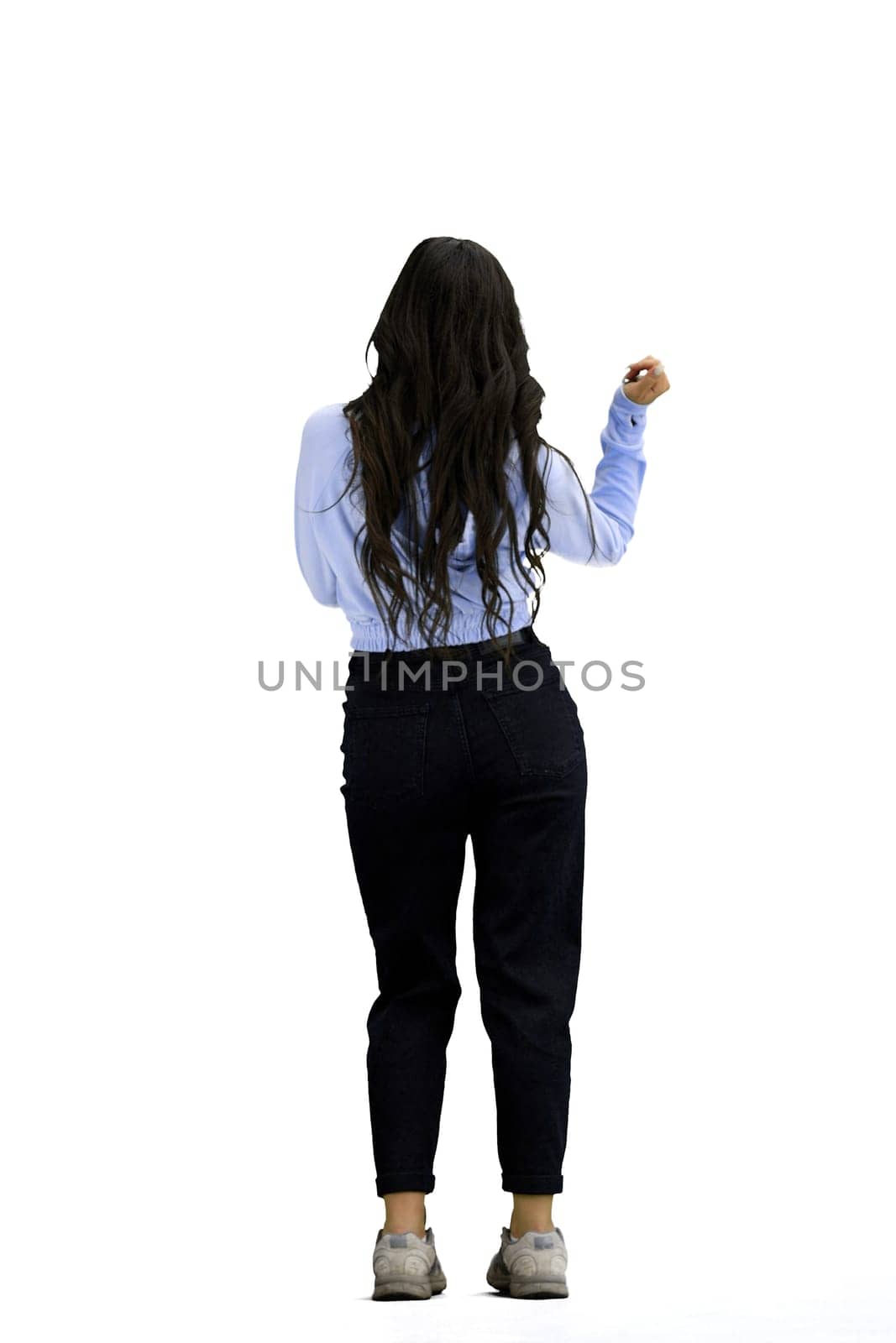 A woman, full-length, on a white background.