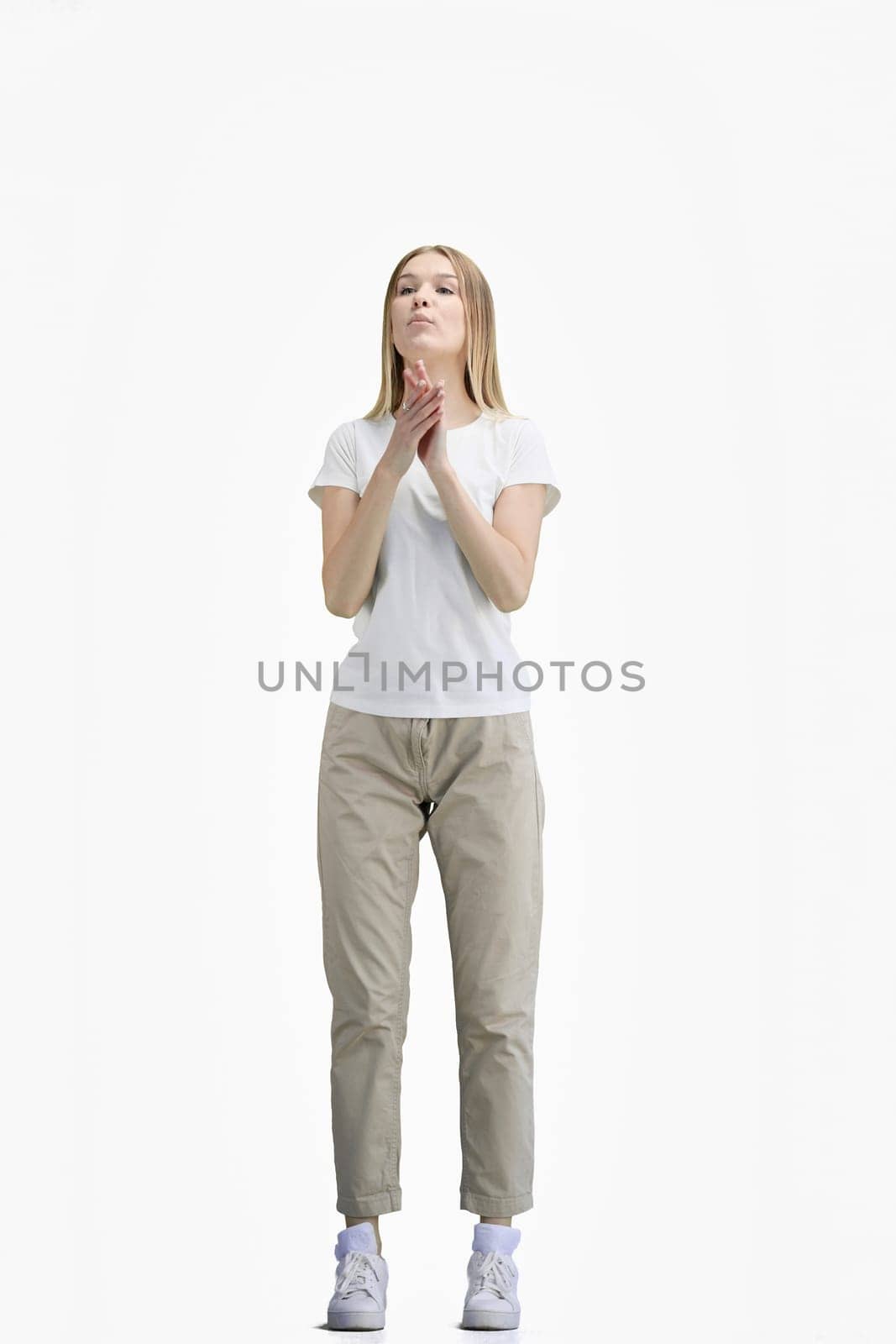 A woman, full-length, on a white background.